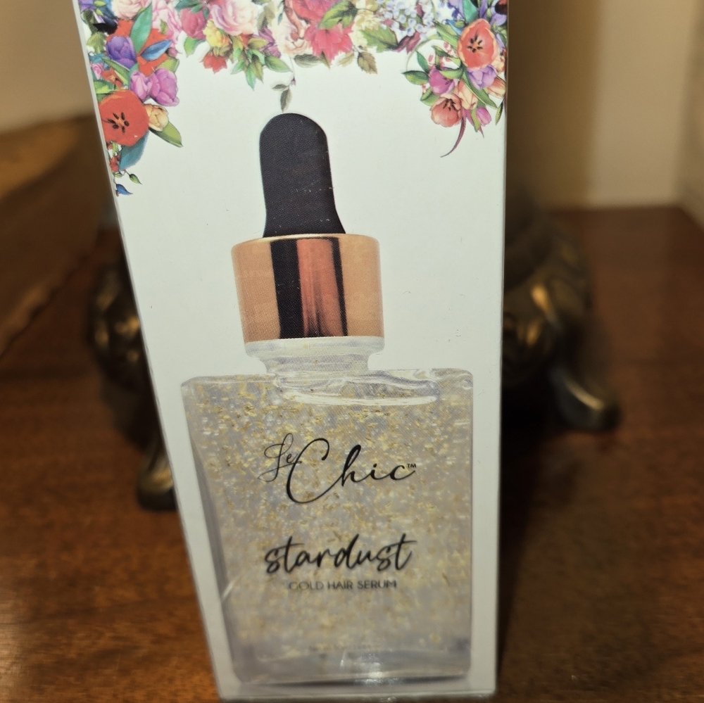 Chic Stardust Gold Hair Serum with Floral Design